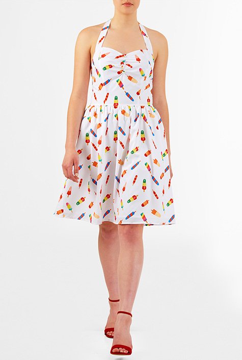 Figure-enhancing seams define our fun print crepe dress styled with halter straps, a ruched sweetheart bodice, seamed waist and ruched-pleat full skirt. 