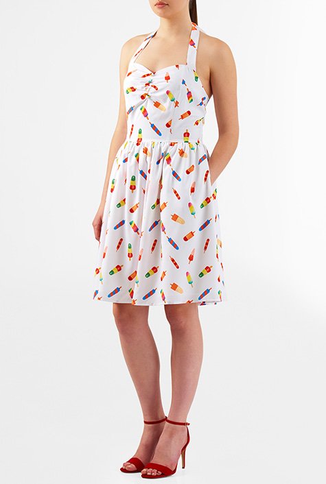 Figure-enhancing seams define our fun print crepe dress styled with halter straps, a ruched sweetheart bodice, seamed waist and ruched-pleat full skirt. 