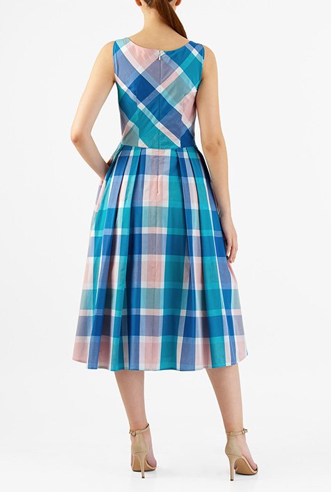 Woven checks add colorful dimension to our cotton fit-and-flare dress styled with a split boat neck bodice.