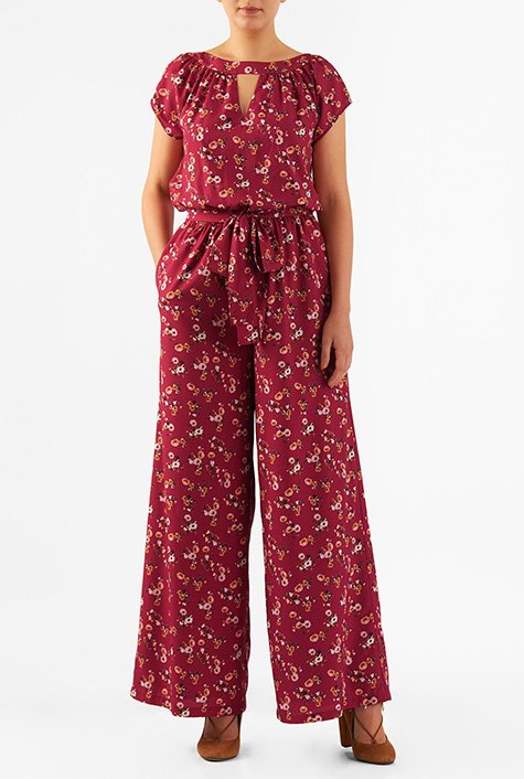 Our floral print crepe jumpsuit in a blousony silhouette is fashioned with a flirty front cutout and finished with breezy hems.