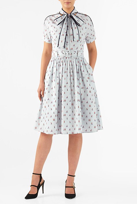 Contrast piped trim at the neck ties and shoulders down to the sleeves gives our royal guard print cotton shirtdress a trend-right twist for Fall.