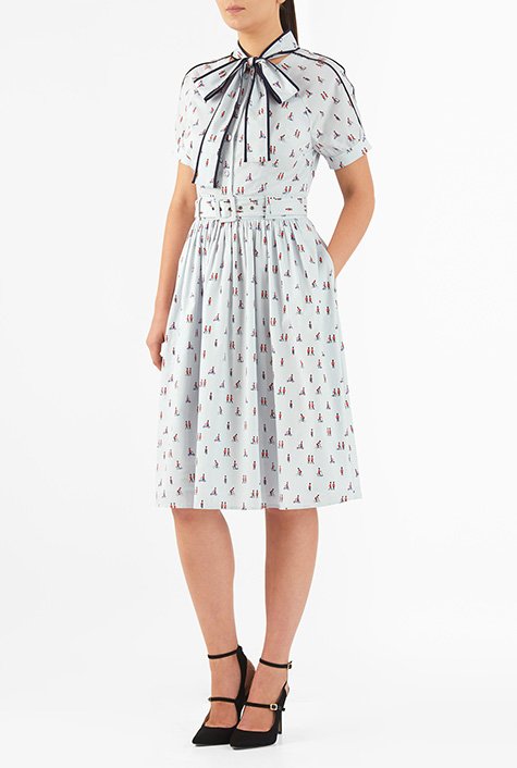 Contrast piped trim at the neck ties and shoulders down to the sleeves gives our royal guard print cotton shirtdress a trend-right twist for Fall.