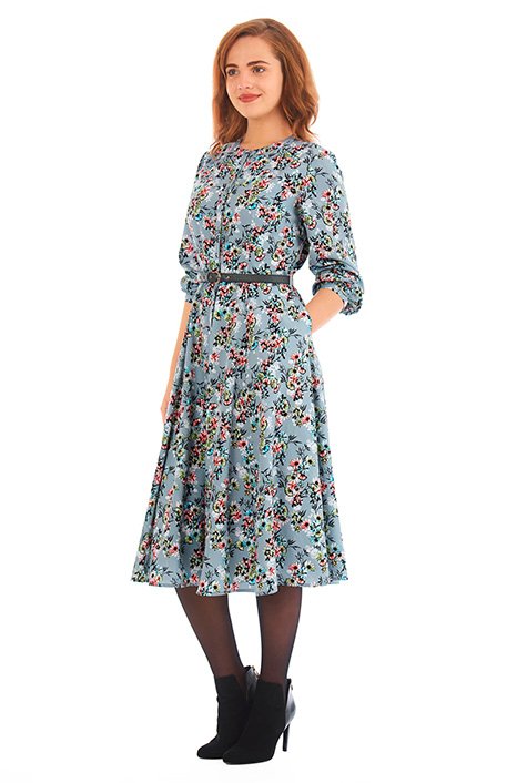 Our floral print crepe shirtdress is capped with a banded jewel neck while a removable faux-leather belt at the waist nips in the silhouette above a flared full skirt.