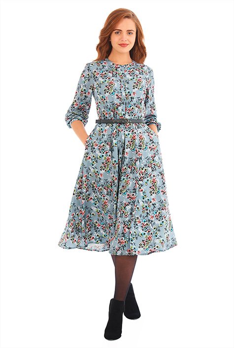 Our floral print crepe shirtdress is capped with a banded jewel neck while a removable faux-leather belt at the waist nips in the silhouette above a flared full skirt.