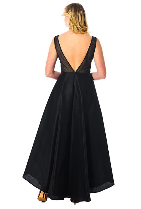 Sheer tulle highlights the shoulders and spine baring V-back of our romantic polydupioni dress that's fitted at the seamed waist and finished with a voluminous high-low hem skirt.