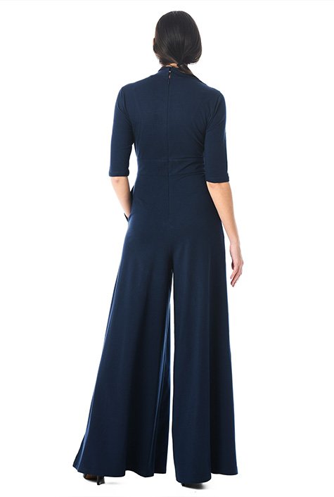 Make the most of the seventies trend in our flattering cotton jersey knit jumpsuit topped with an asymmetric neckline and finished with flowing wide legs.