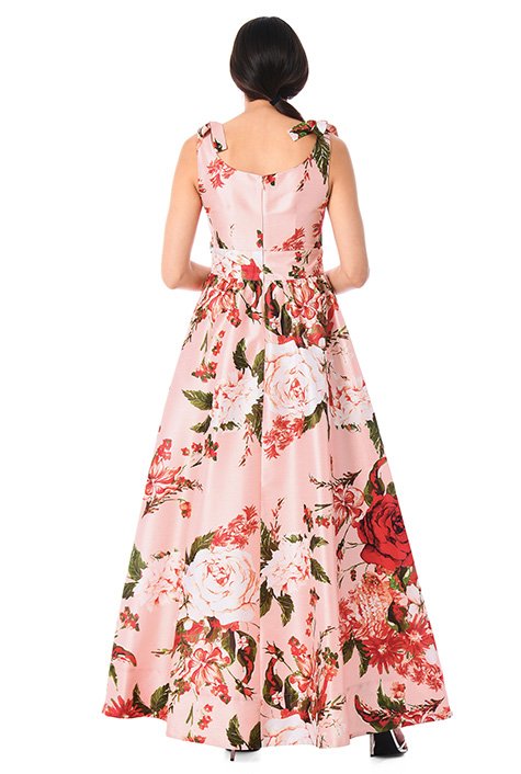 Our floral print polydupioni maxi dress is designed to flatter and enhance with an angled pleat bodice, banded empire waist and ruched pleat full skirt.