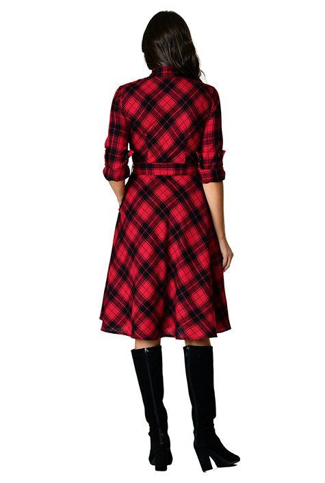 Our cotton check shirtdress is capped with a banded collar and the seamed waist nips in the silhouette above a full skirt that gently swishes as you move.