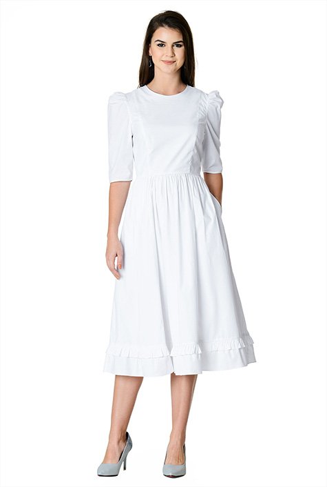 Exaggerated shoulders add retro drama to our cotton poplin dress, styled with a princess seamed bodice and ruched pleat full skirt with ruffle layers at the hem.