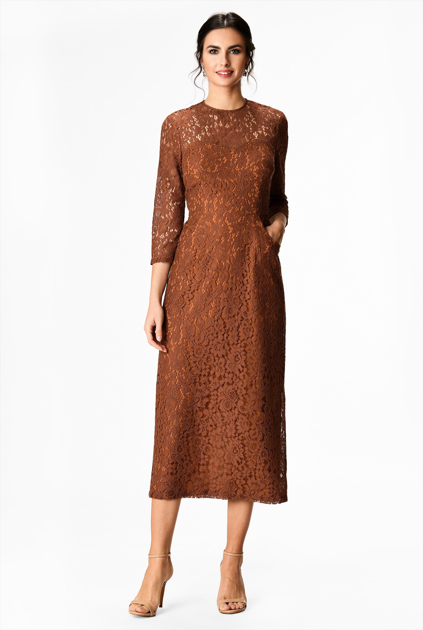 An illusion yoke tops our special event sheath dress of embellished floral lace that's feminine and classic with functional pockets at the slim skirt.