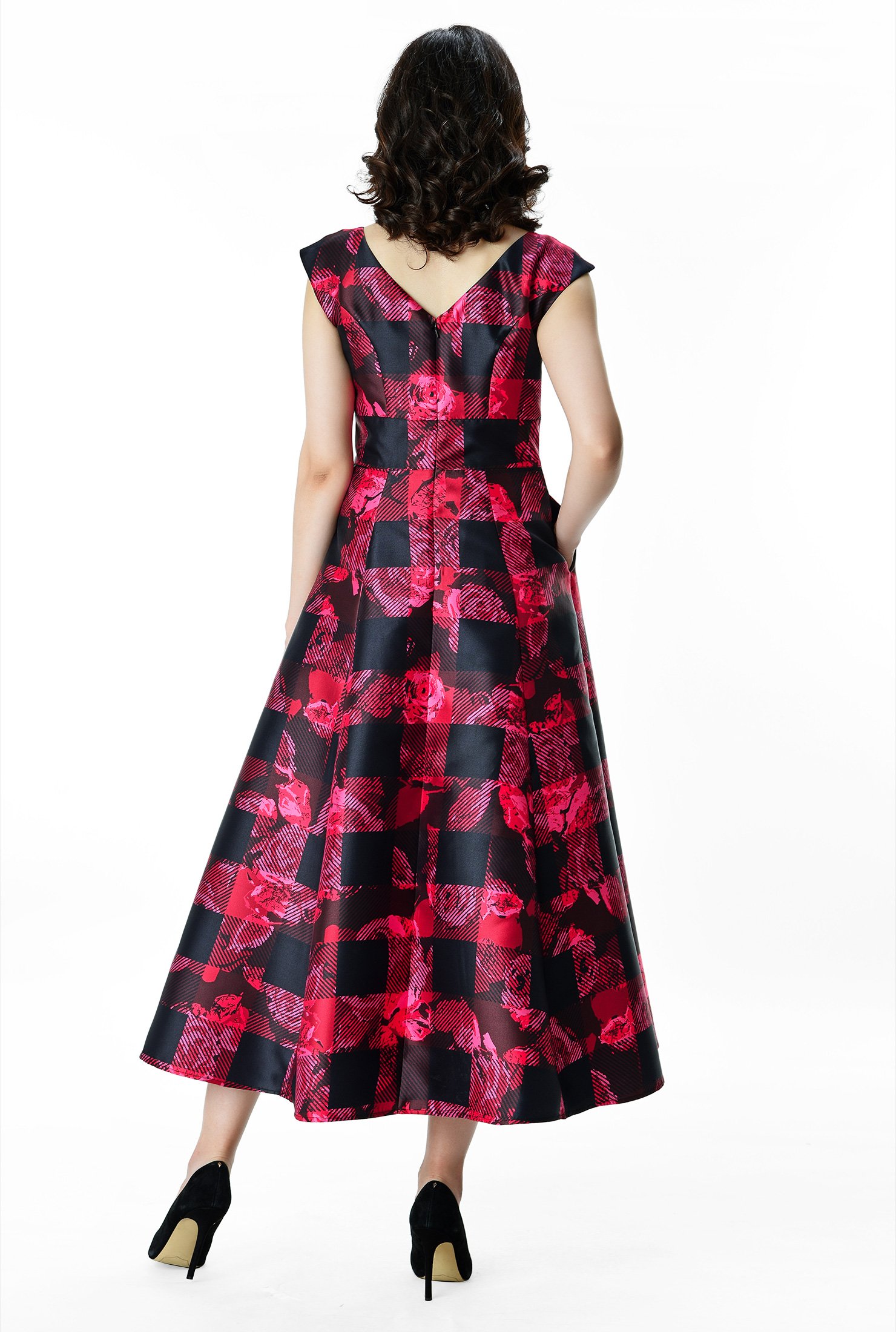 A standout for special occasions with its elegant silhouette, our floral and check print dress is styled with a princess seamed bodice and full flared skirt.