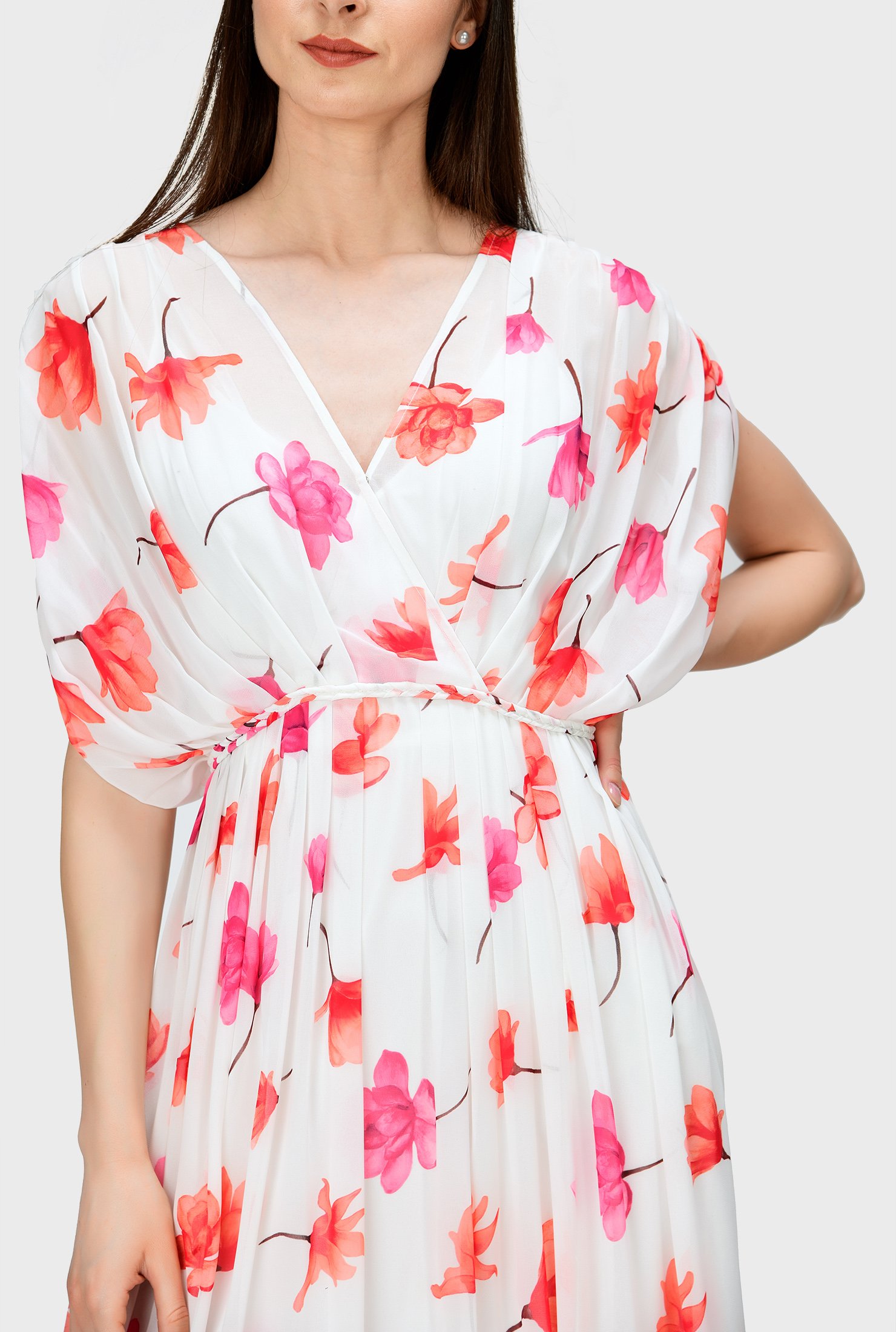 Our chic, blouson dress in floral print georgette is shaped by shirred shoulders and empire waist and cinched in with self-fabric braided trim. 
