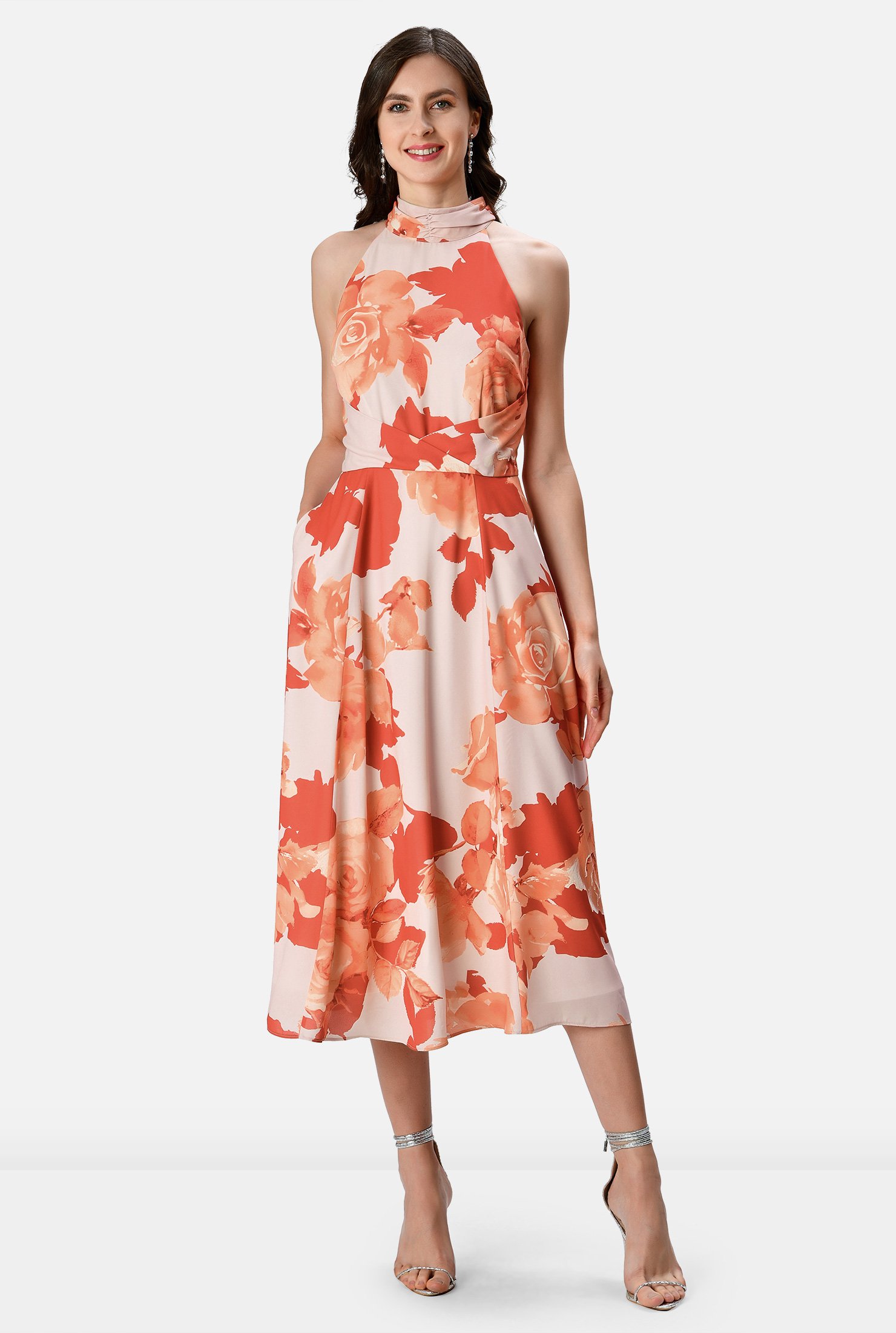 Golden hour favorite! Feel the breeze and the sun on your shoulders in our rose print crepe dress with a halter neck and a crossed front waist atop a full flare skirt that makes it a perfect choice for an unforgettable party.