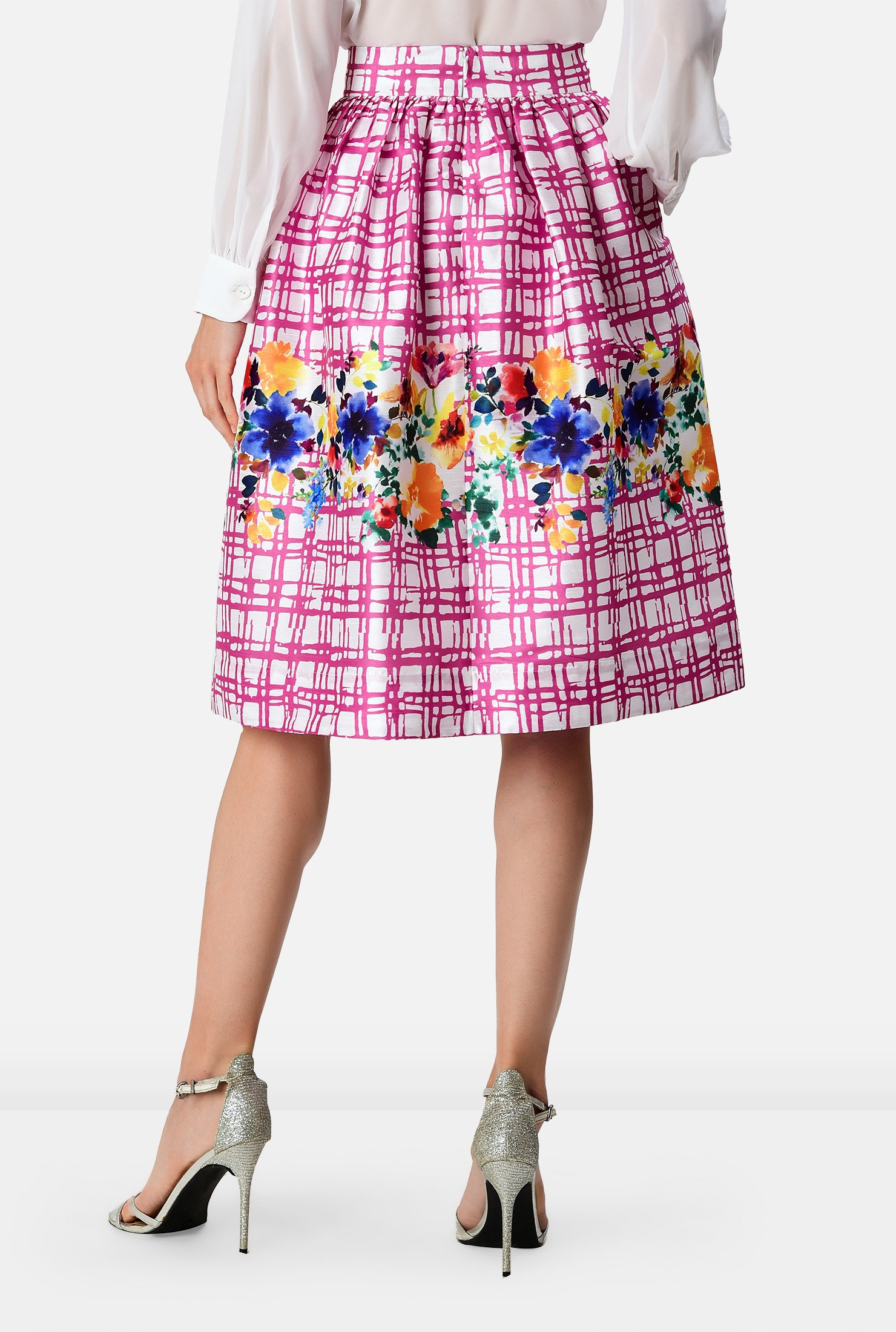 Watercolor florals pop up in vibrant hues on our check print poly-dupioni skirt styled with a banded waist and ruched pleating for a full flare.