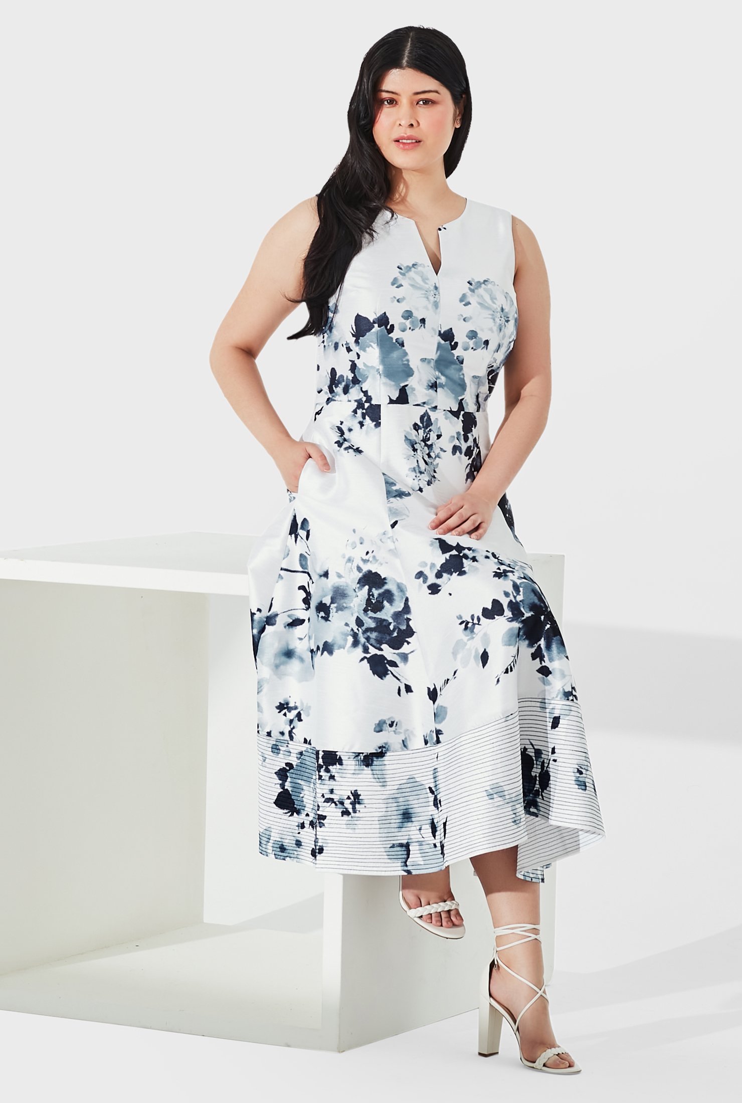 Slip on our floral print dupioni dress and look polished in minutes flat while a trapunto stitch hemline completes the party look.