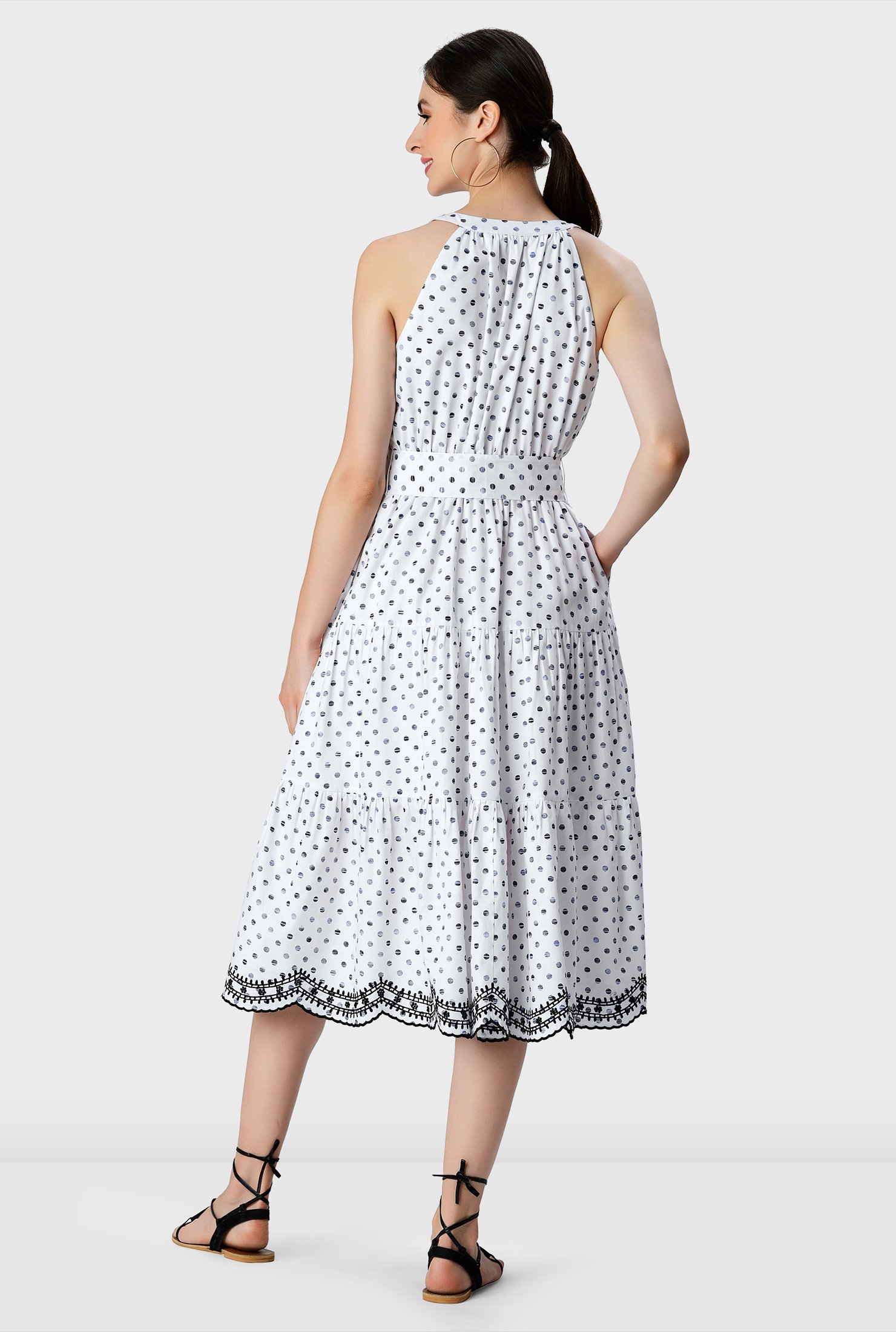 Fresh as the season itself, our happy polka dot print cotton elevates the everyday with eye-catching details like embellished scallops at the swingy hem.