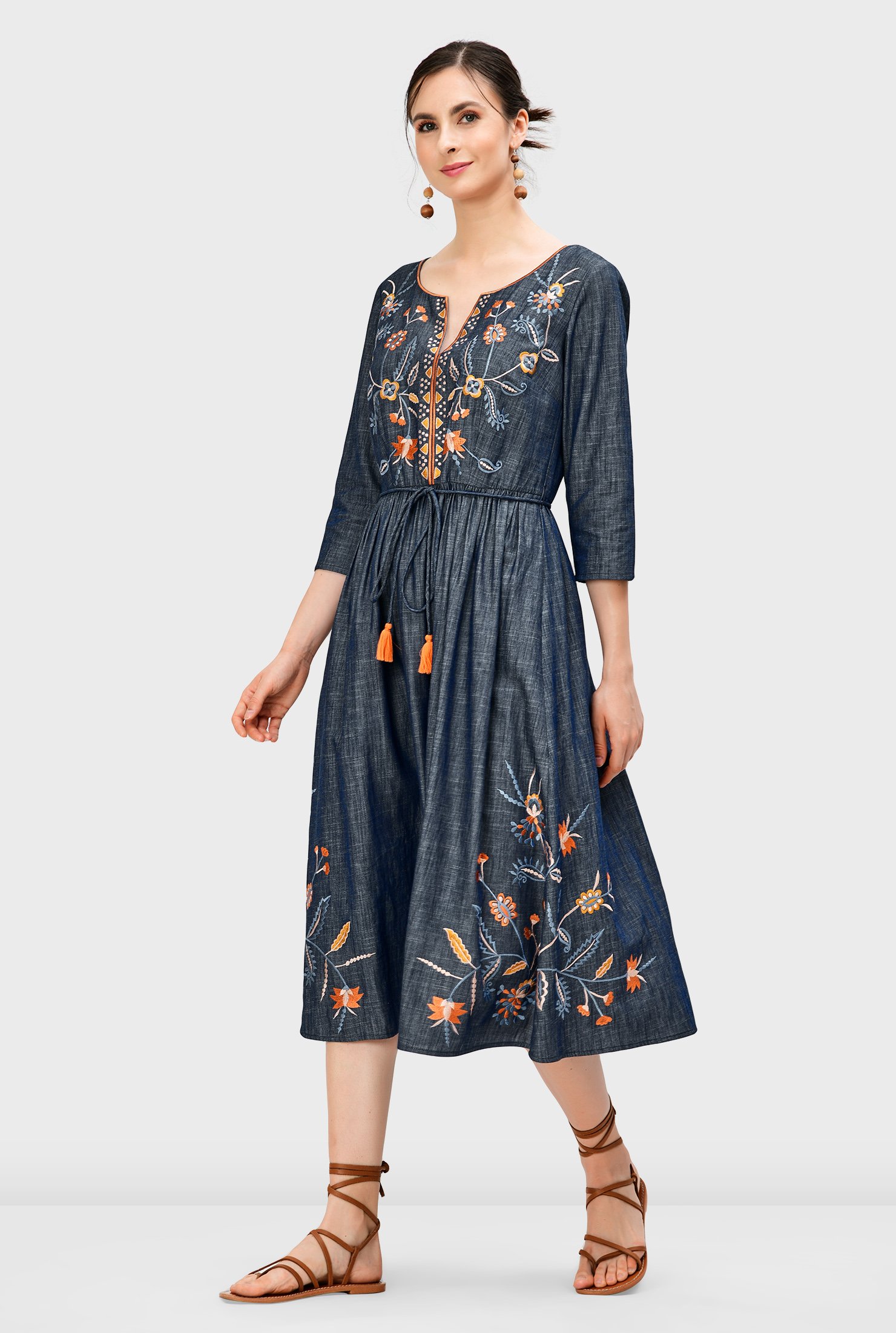 Perfect your work-from-anywhere style with our versatile cotton chambray dress with floral vine embroidery that strikes a balance between ease and elegance. 