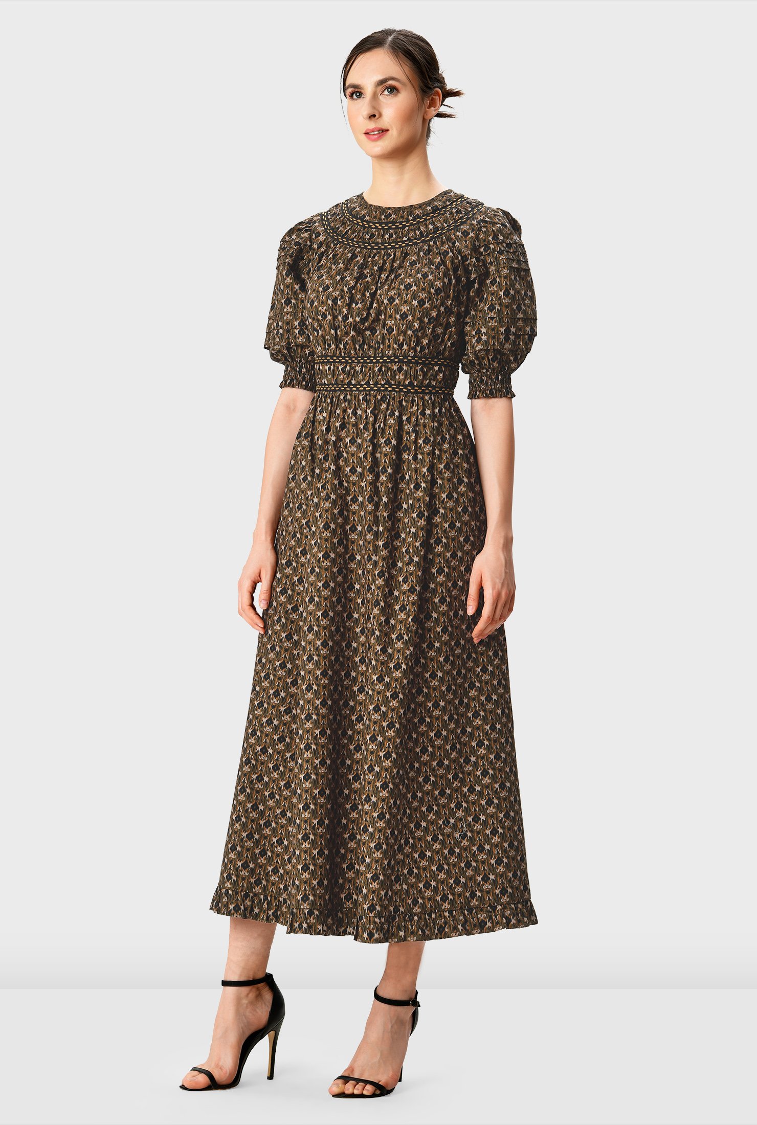 Earth-toned, breezy and heat-wave ready! Terracotta tones pattern our ikat print cotton poplin dress with stripe embroidery and shirred neckline and waist atop a ruched pleat full skirt with ruffle trim at the hem.