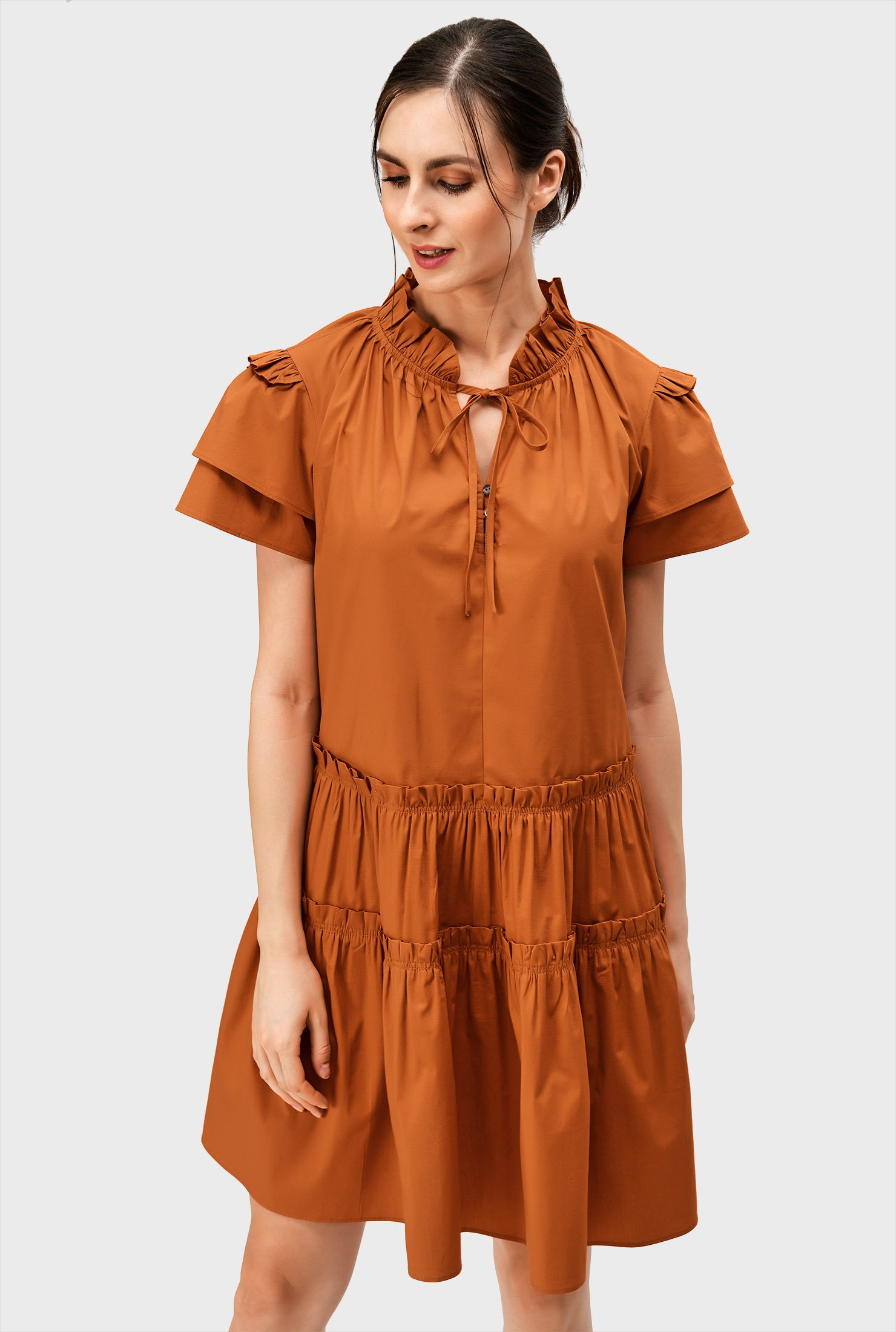 Our crisp cotton poplin dress offers pretty ruffle frills and a tiered skirt for a look that's well-matched to summery fun.
