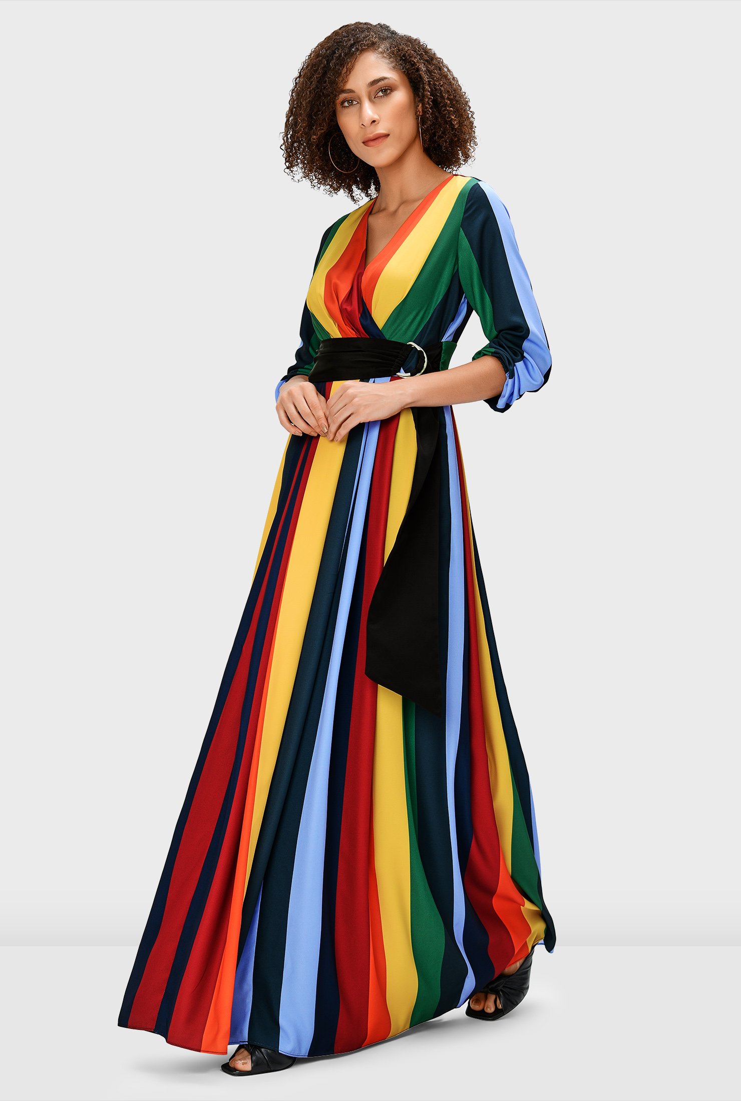 Multi-color stripe print in linear lines adds a slimming effect to our breezy crepe maxi dress detailed with a pleated surplice bodice and strategic ruching to ensure a flattering fit.