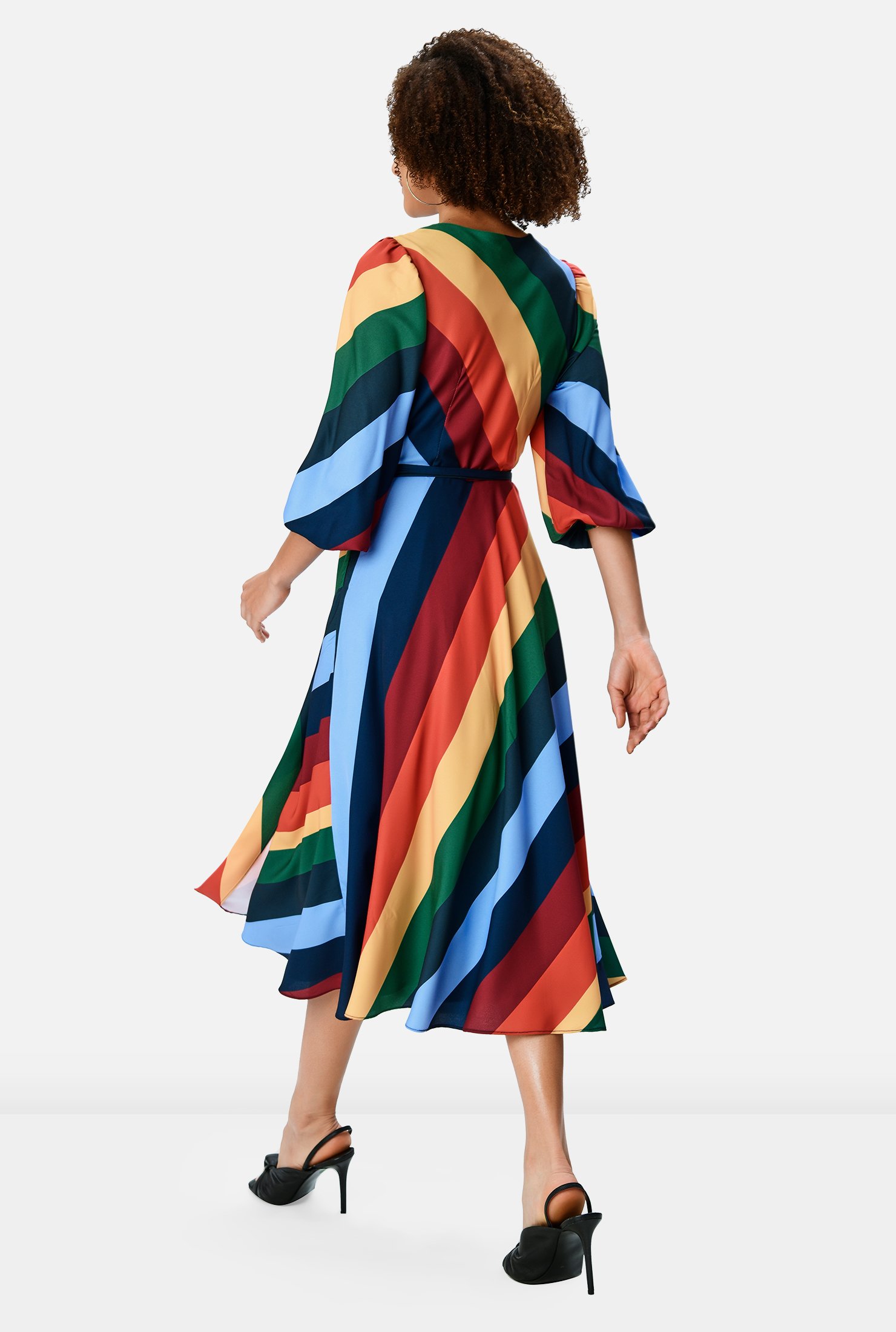 Rainbow bright stripes pattern our bias-cut crepe wrap dress cinched in at the seamed waist with attached half-ties.