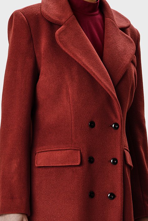 Melton-like with rich woolly texture lends a vintage-chic attitude to our cozy coat done in a double-breasted silhouette with front pockets and back vent.