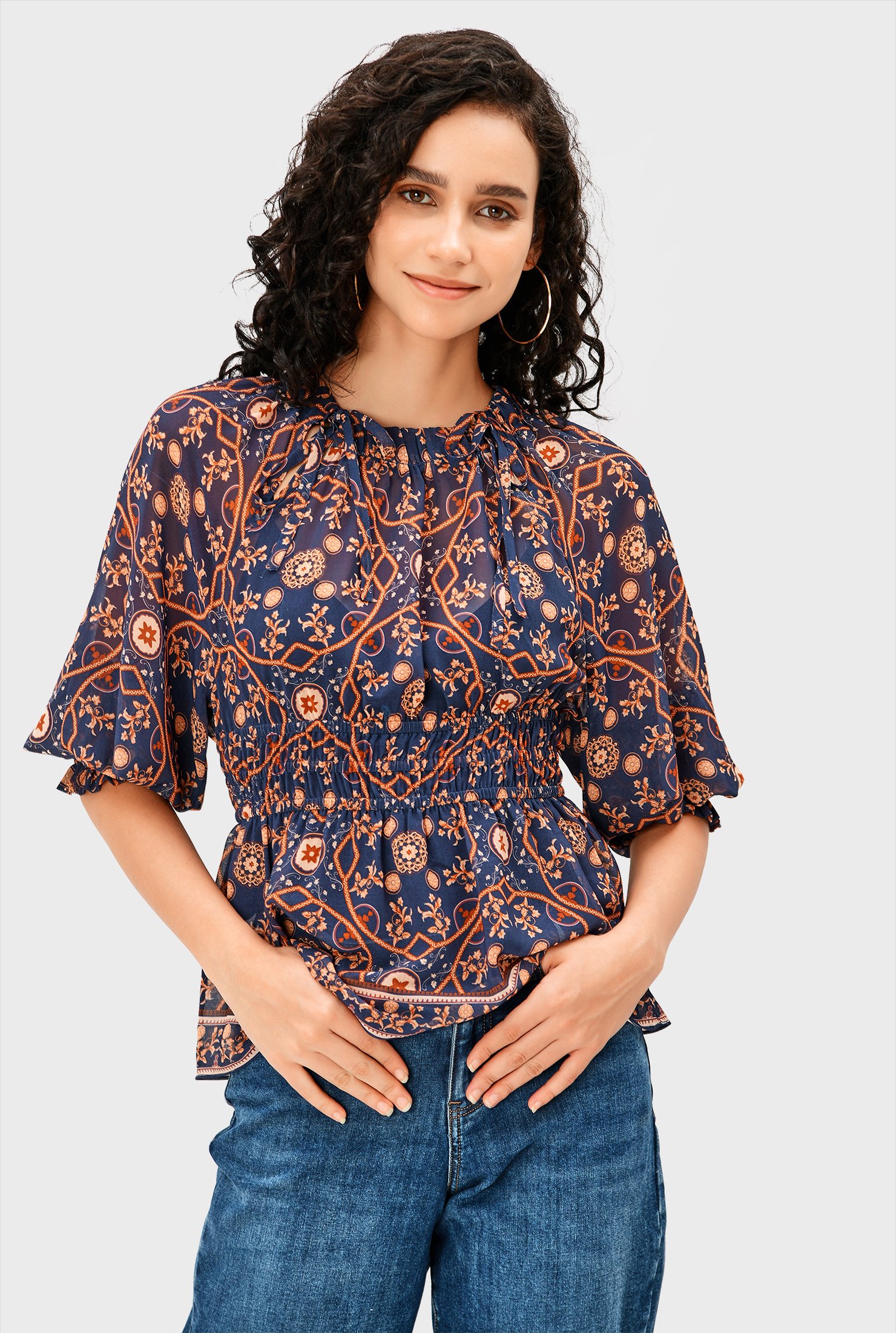 Shop Graphic floral print georgette smocked peplum blouse | eShakti