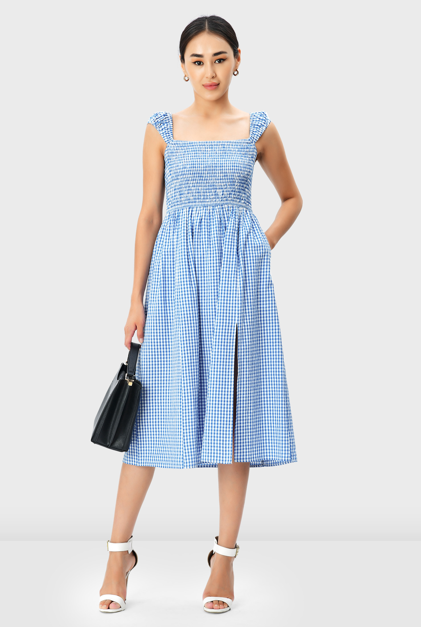 Shop Smocked seersucker gingham check cotton vented dress
