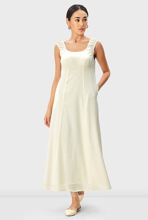 Efforless and flattering, this ivory A-line wedding dress is complete with  a V-neckline, empire waistline and keyhole-back detail. – Kelsey Rose