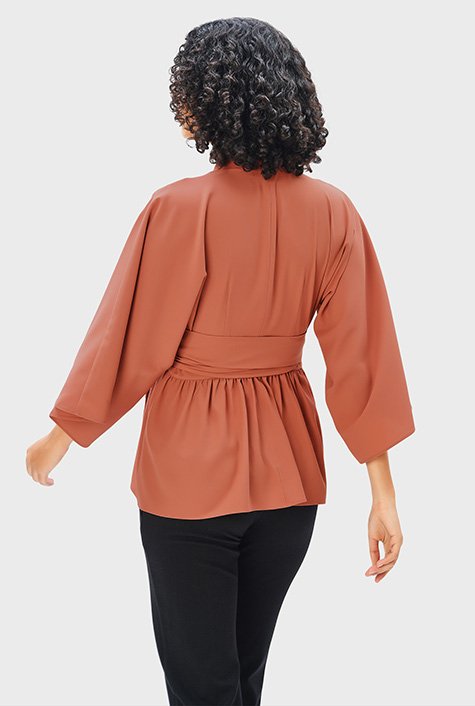 Shop Plunge Crepe Empire Peplum Top Eshakti